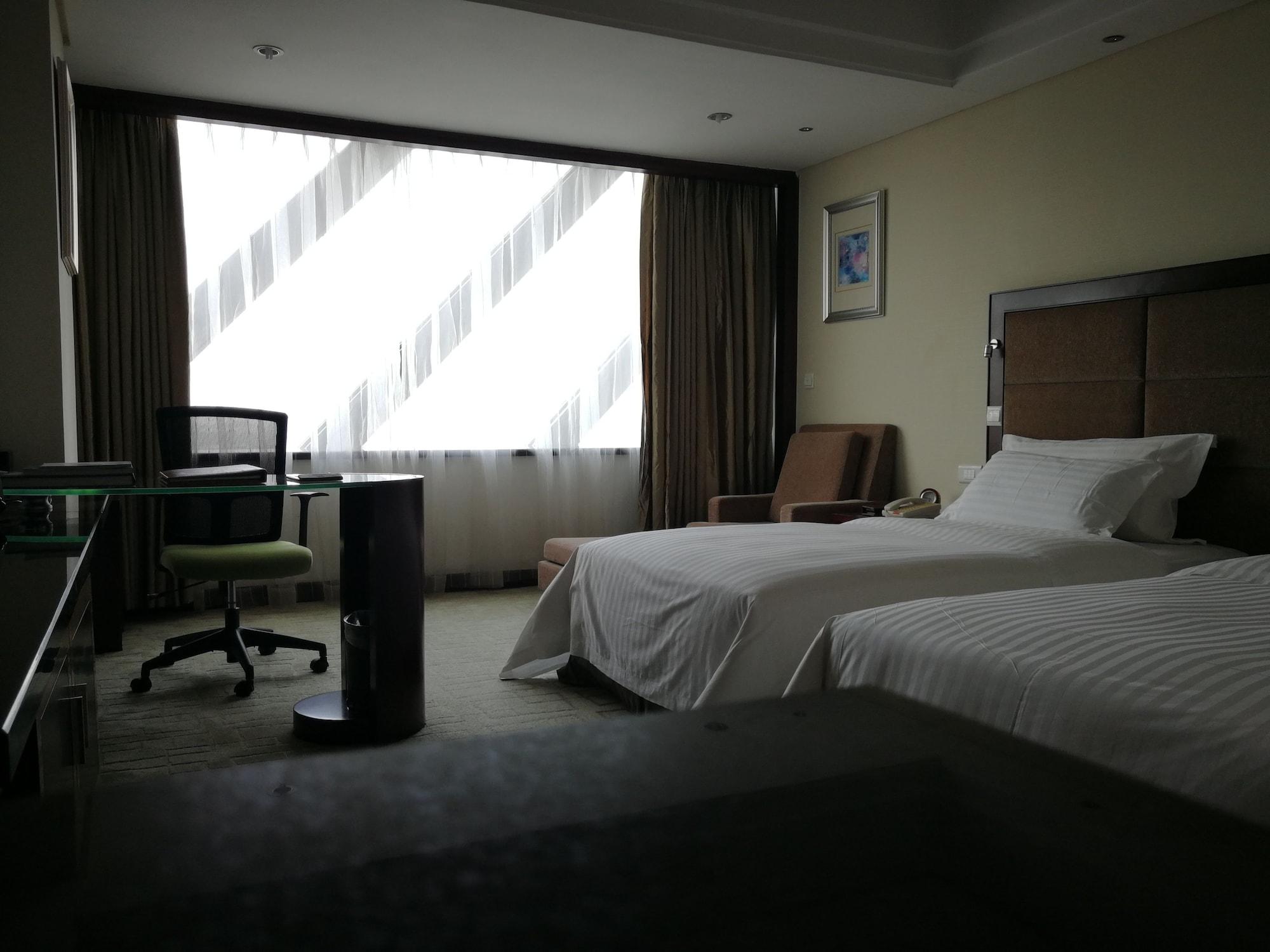 Daysun International Hotel Canton Esterno foto